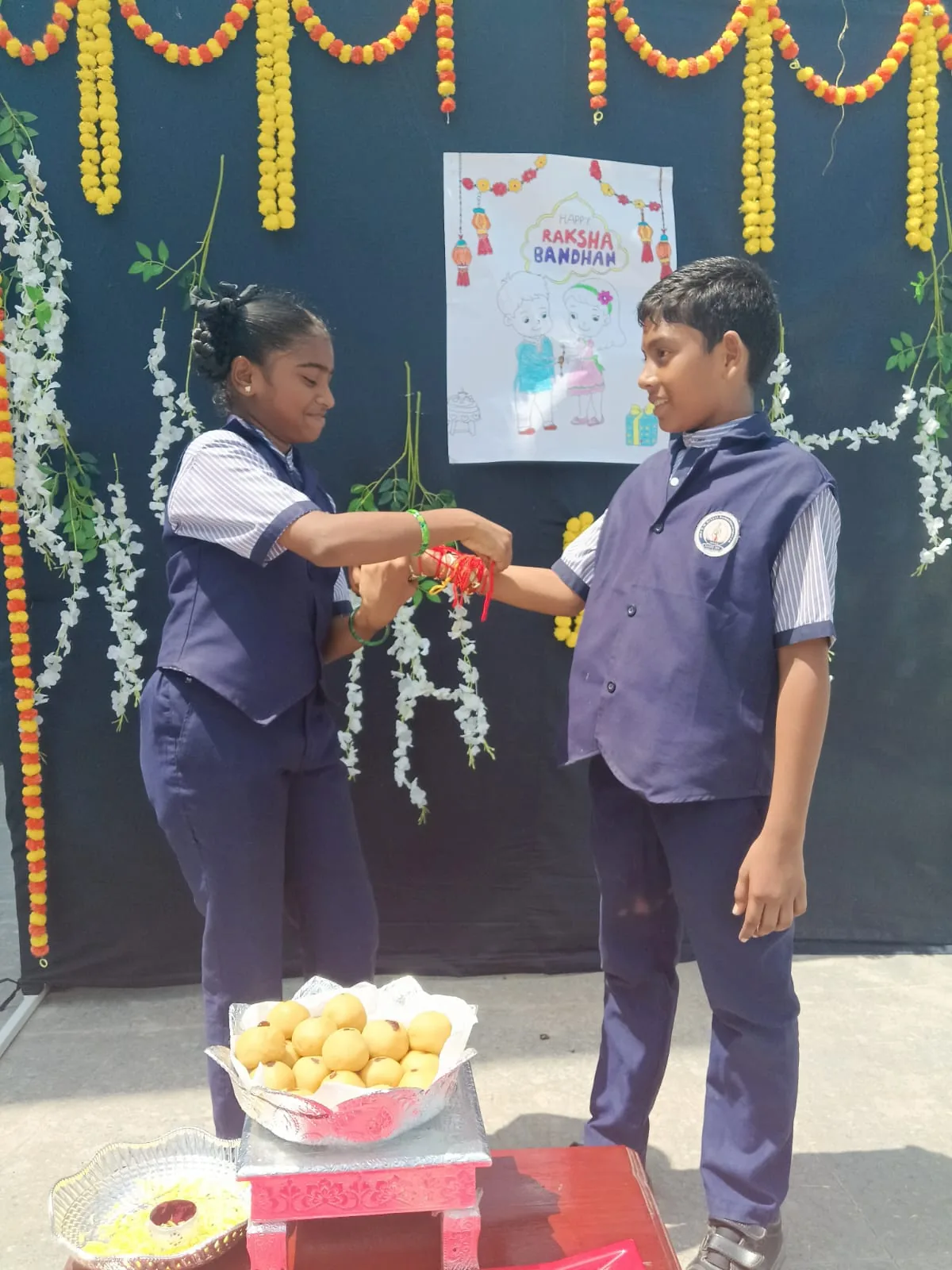 Students celebrating Raksha Bandhan at school