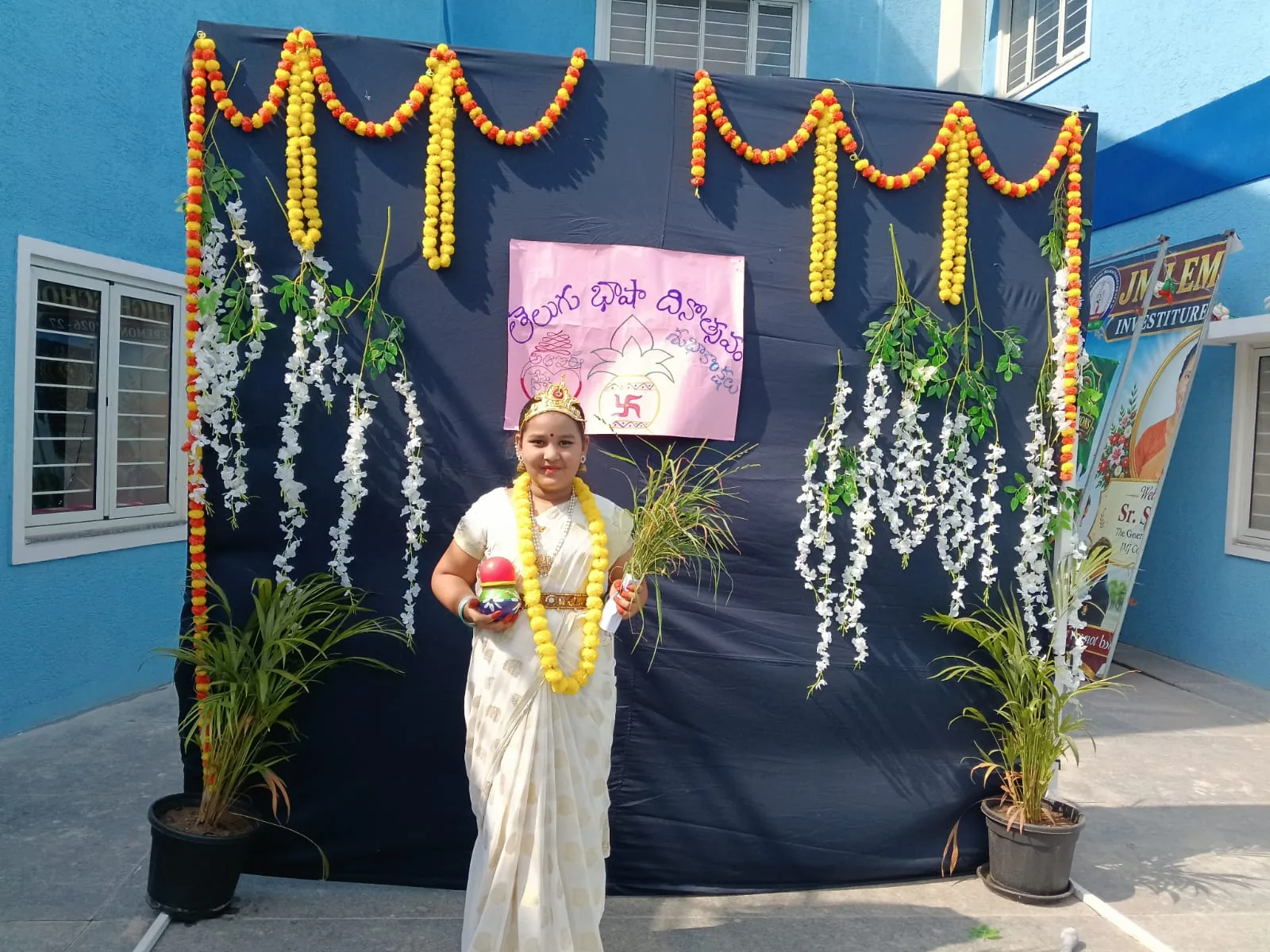 Students participating in Telugu Bhasha Dinotsavam